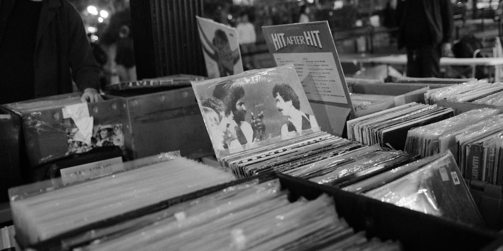 Crates of vinyl records on display at a record fair